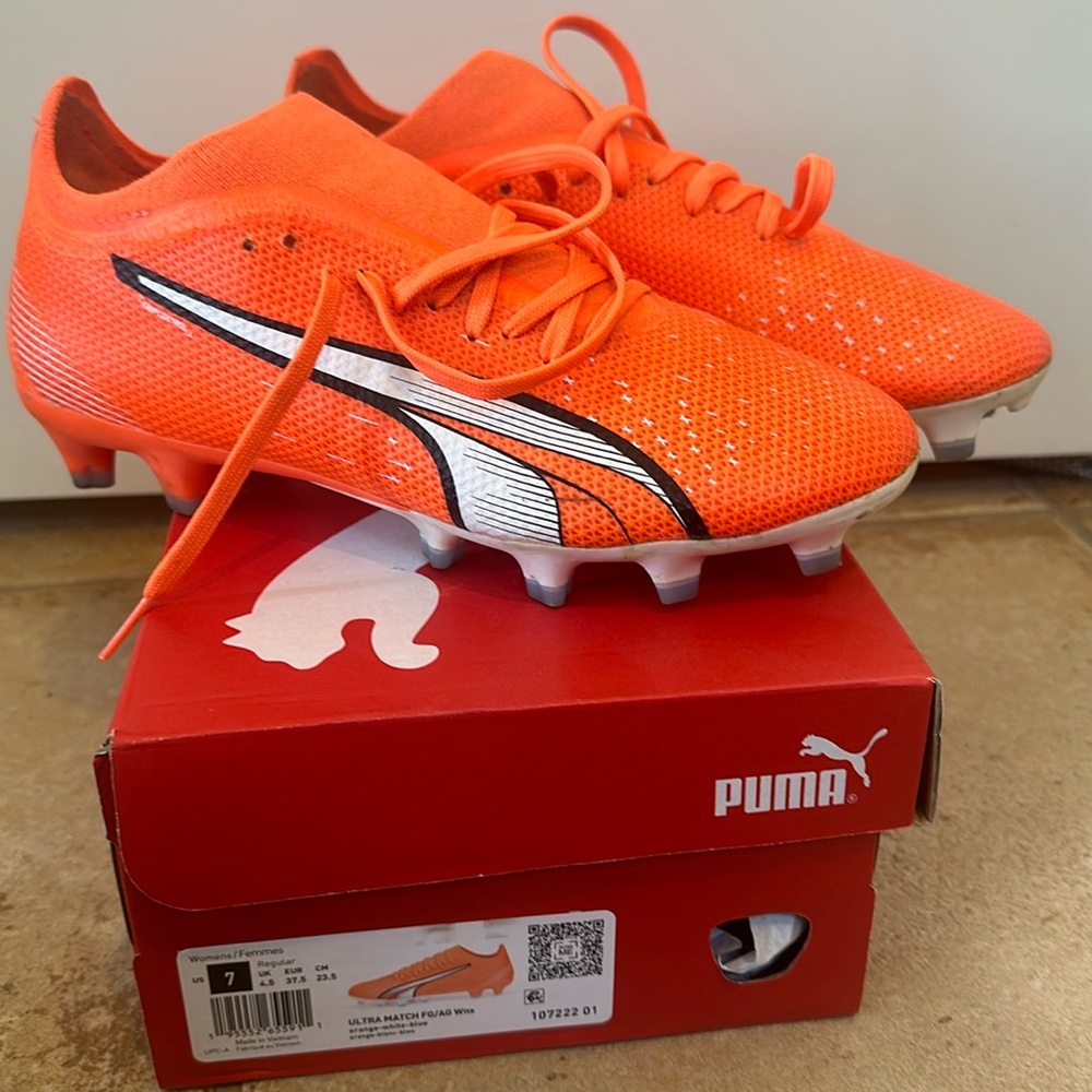 Gently used soccer cleats